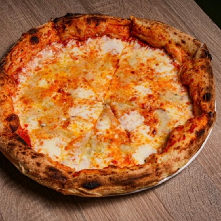 Savor our cheese pizza